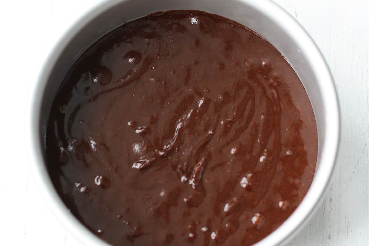 chocolate cake batter in a pan