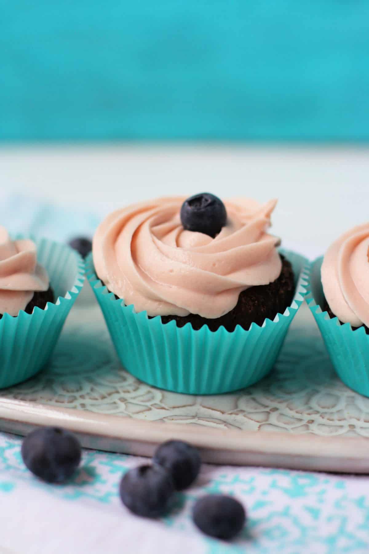 chocolate cupcakes with berry icing