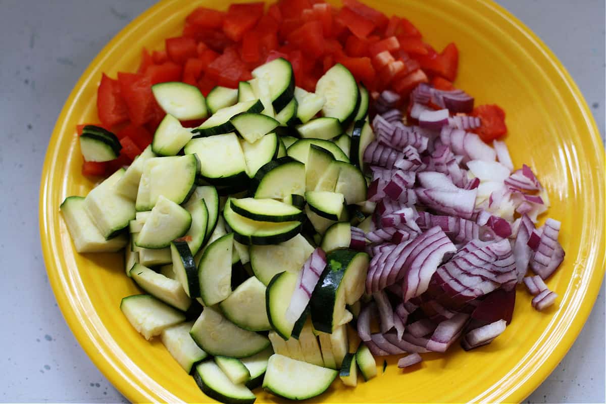 chopped peppers onions and zucchini