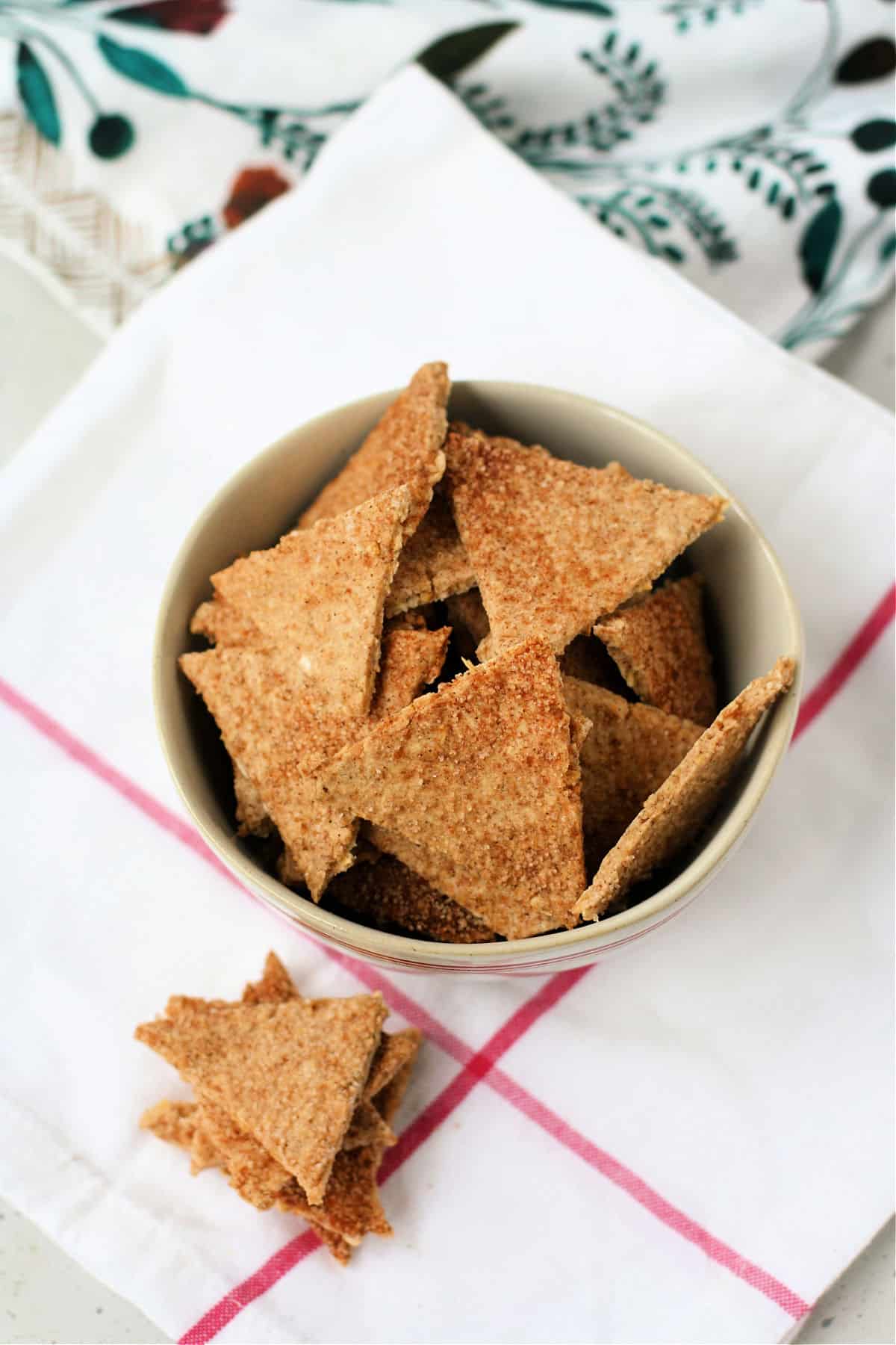 crispy cinnamon oat crackers in a bowl