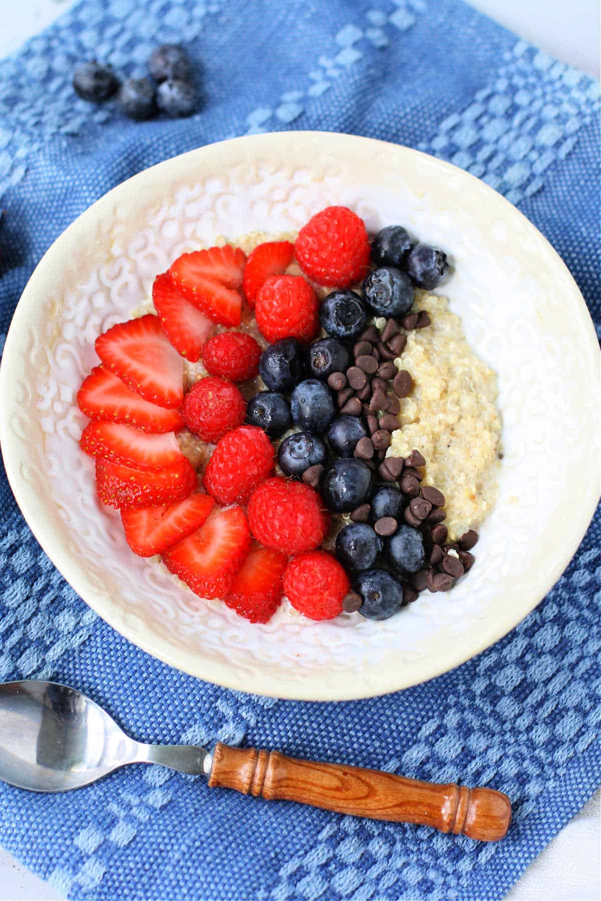 dairy free quinoa porridge topped with fruit