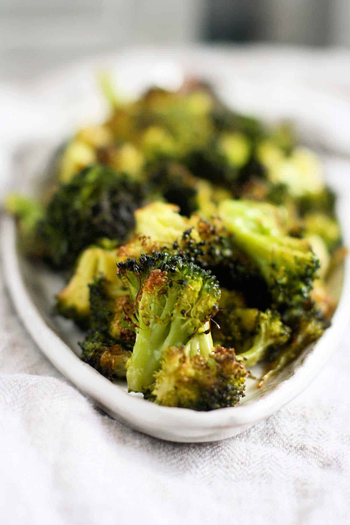 garlic roasted broccoli on a tray