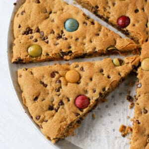 slices of giant gluten free vegan chocolate chip cookie
