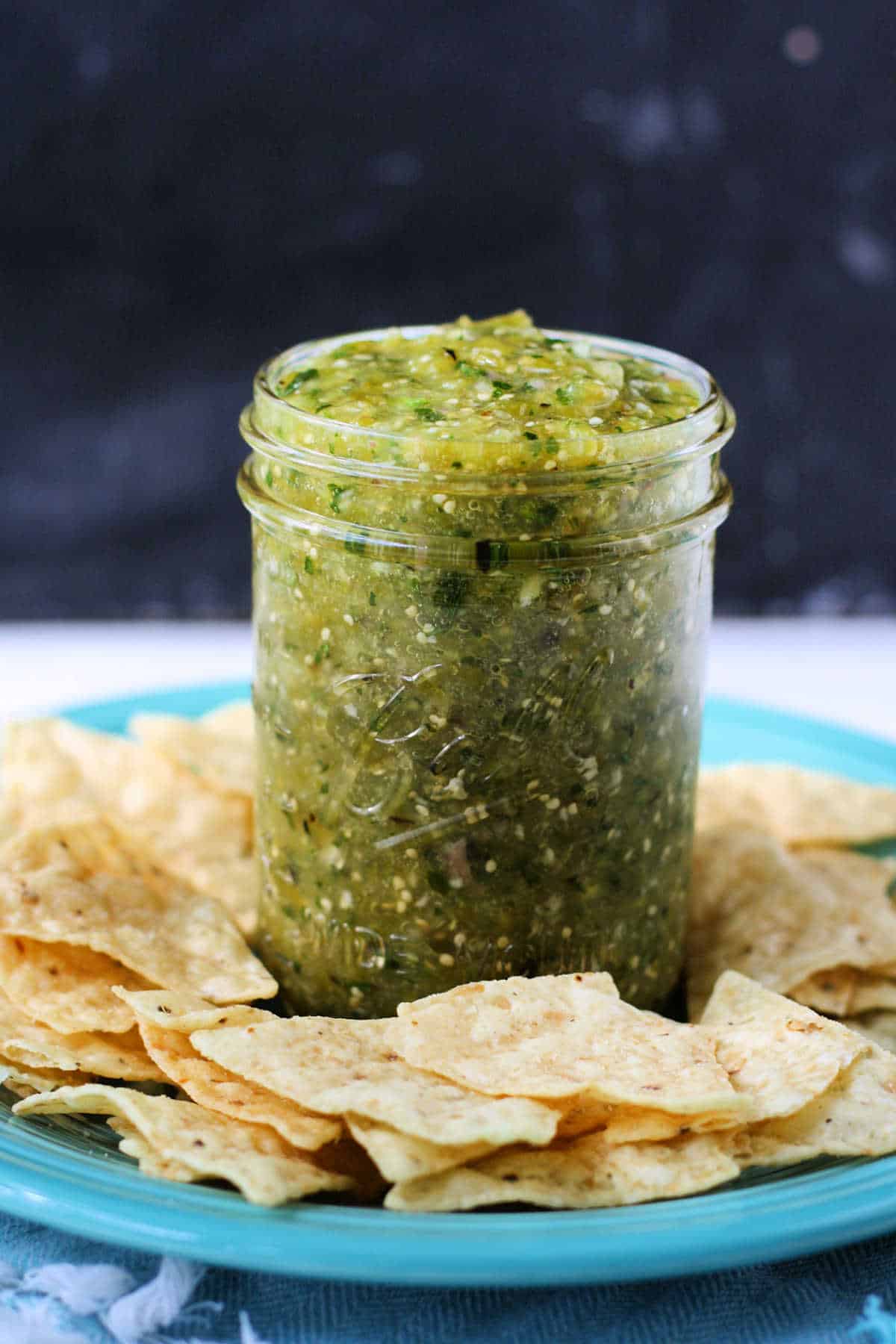 jar of salsa verde with chips