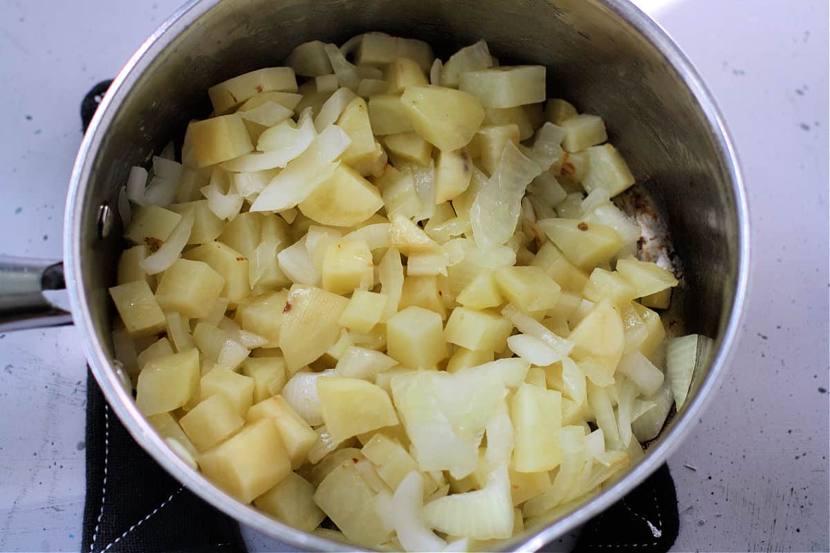 potatoes and onions in a pot