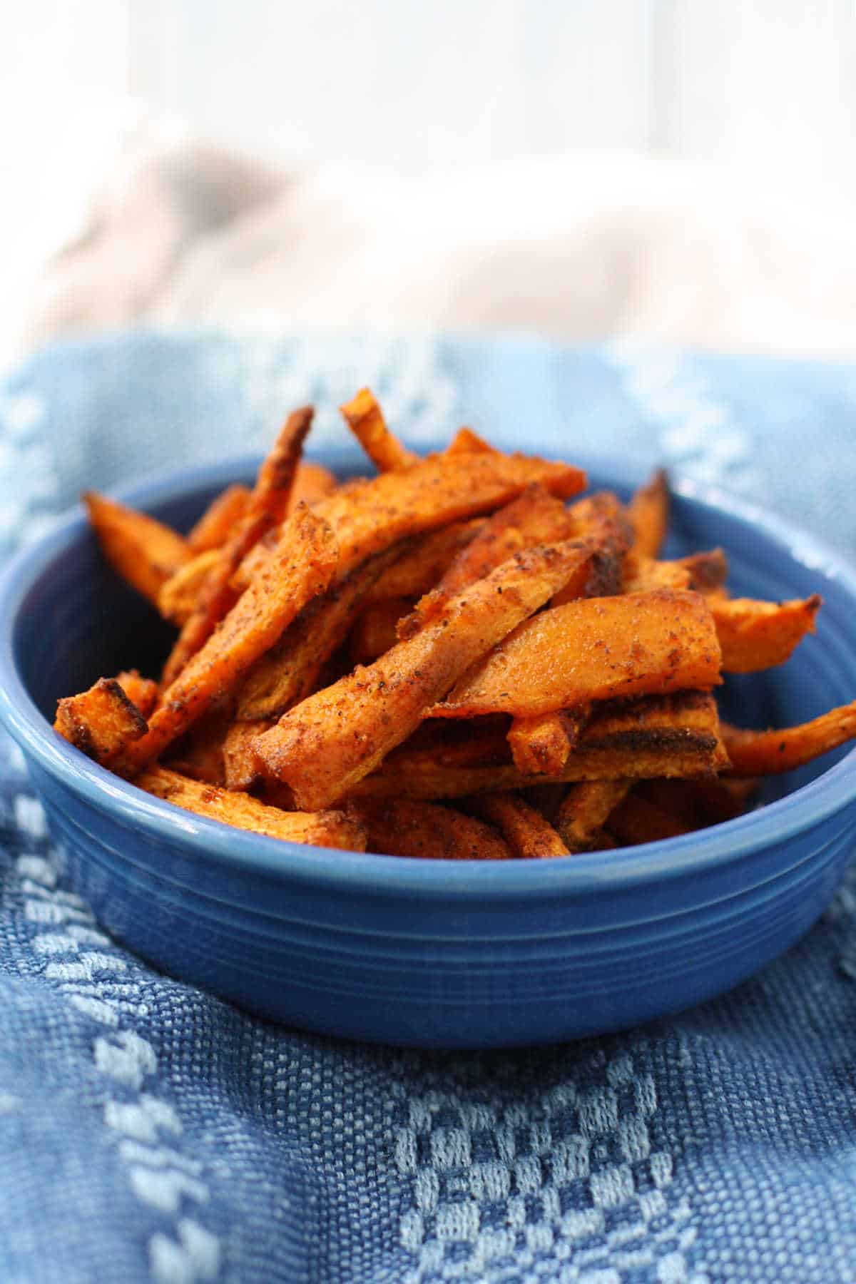 sweet potato fries in a blue bowl