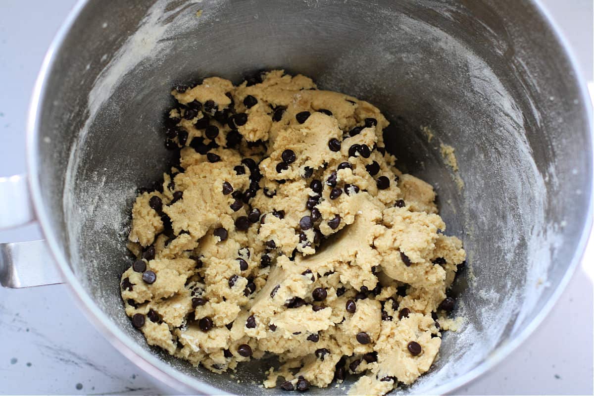 vegan chocolate chip cookie dough in a stainless steel mixing bowl