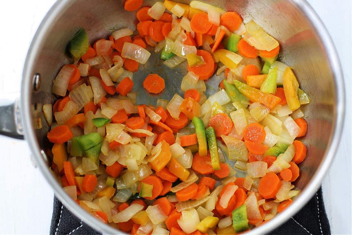 carrots onions and peppers in pan