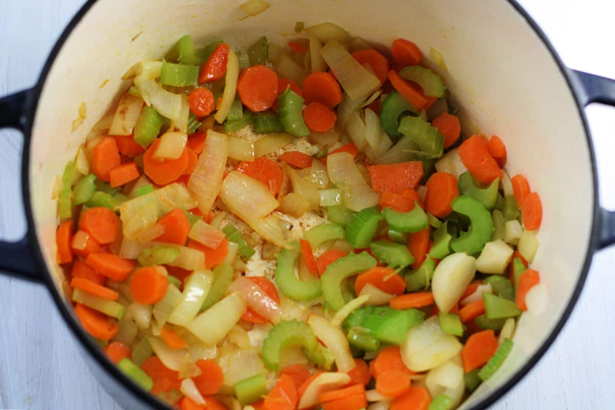 carrots onions and celery in soup pot