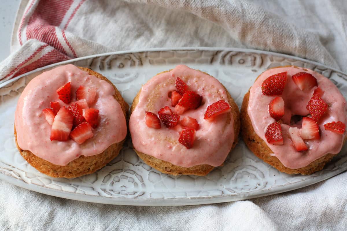 vegan strawberry donuts with icing