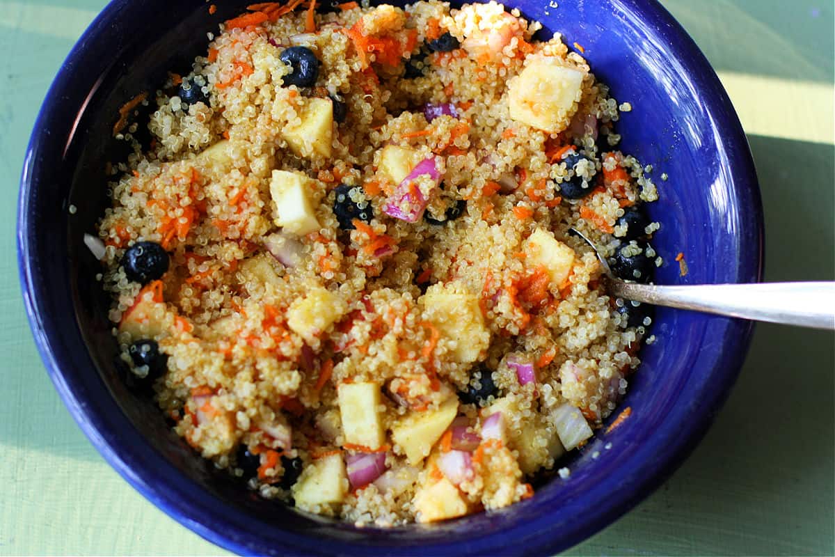 curry quinoa salad with berries and apples