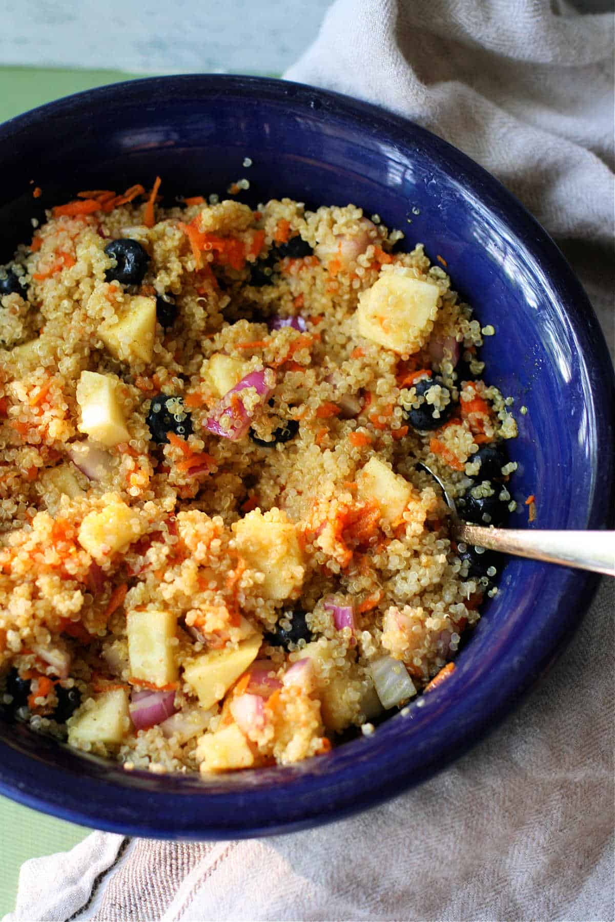 vegan curried quinoa salad in a large bowl