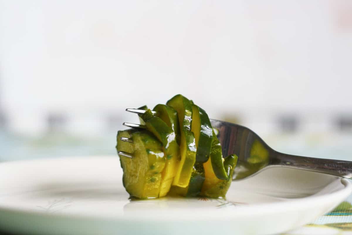sweet pickles on a white plate