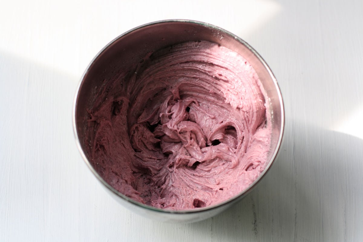 blueberry frosting in a bowl