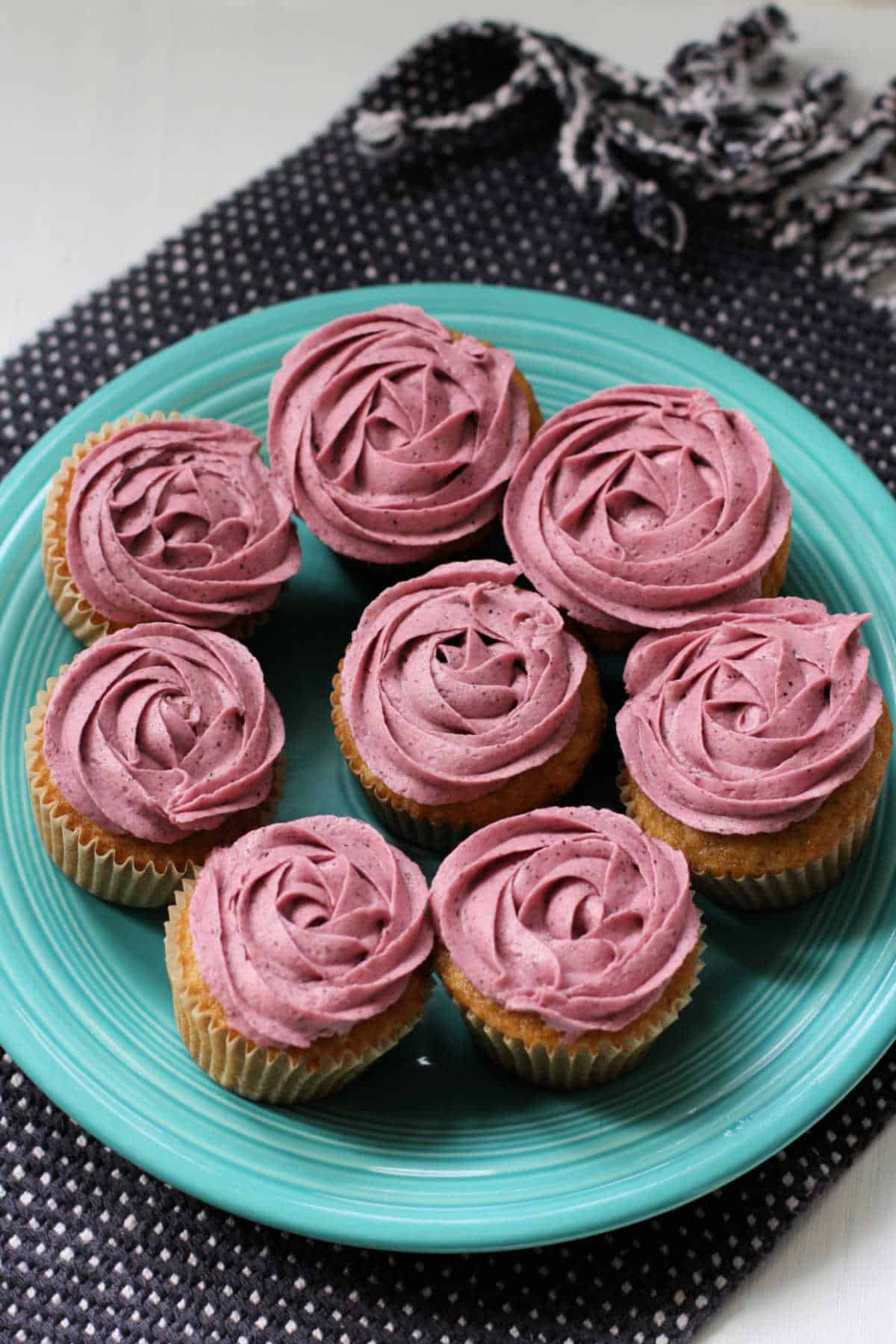 vanilla cupcakes with blueberry icing