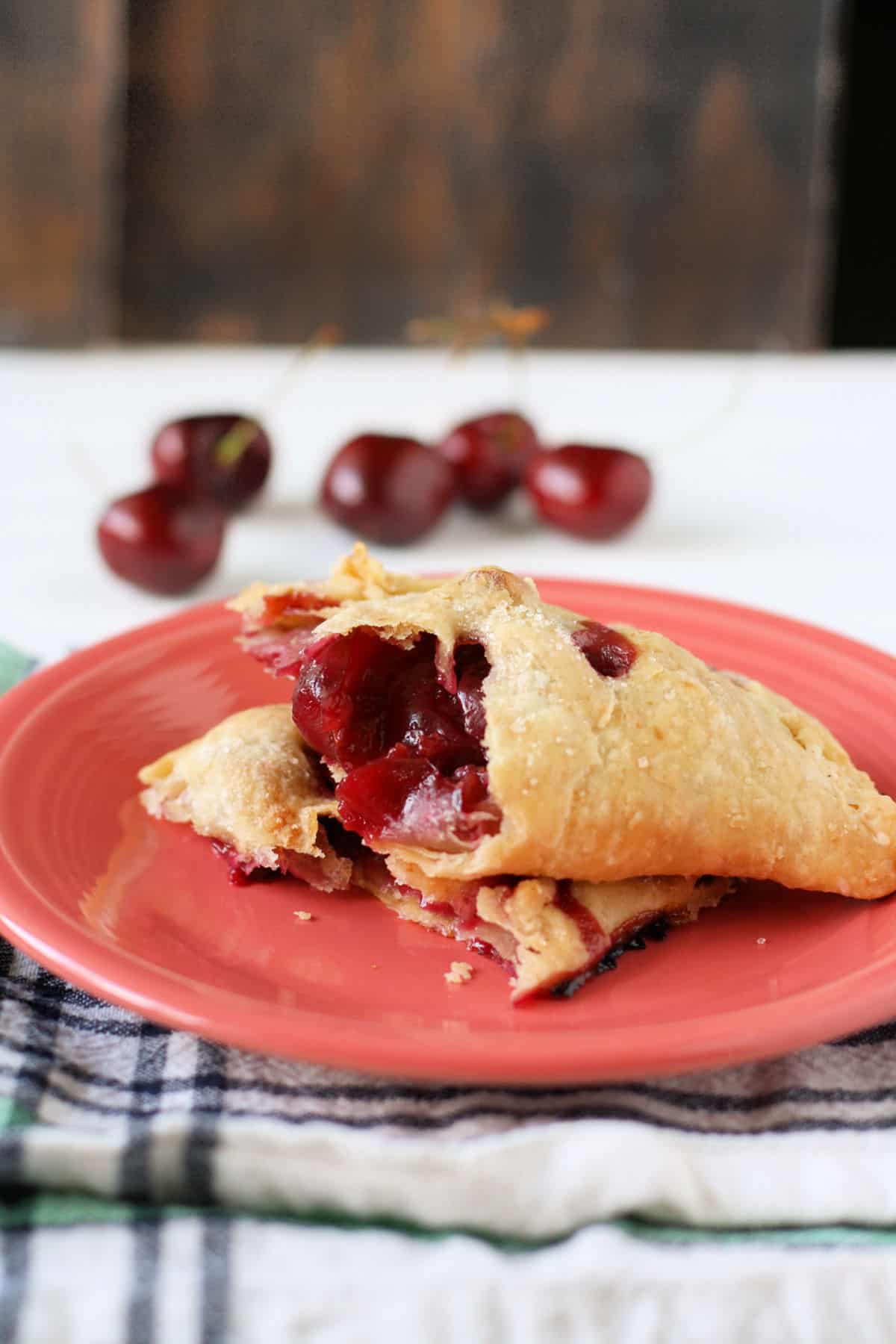 vegan cherry hand pie broken in half