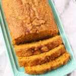 sliced vegan pumpkin bread on a tray