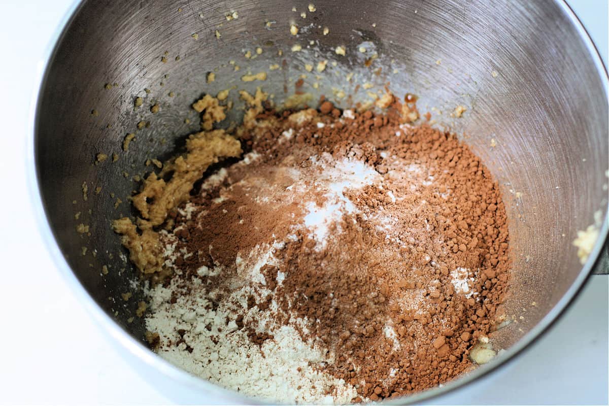 adding the dry ingredients to the bowl