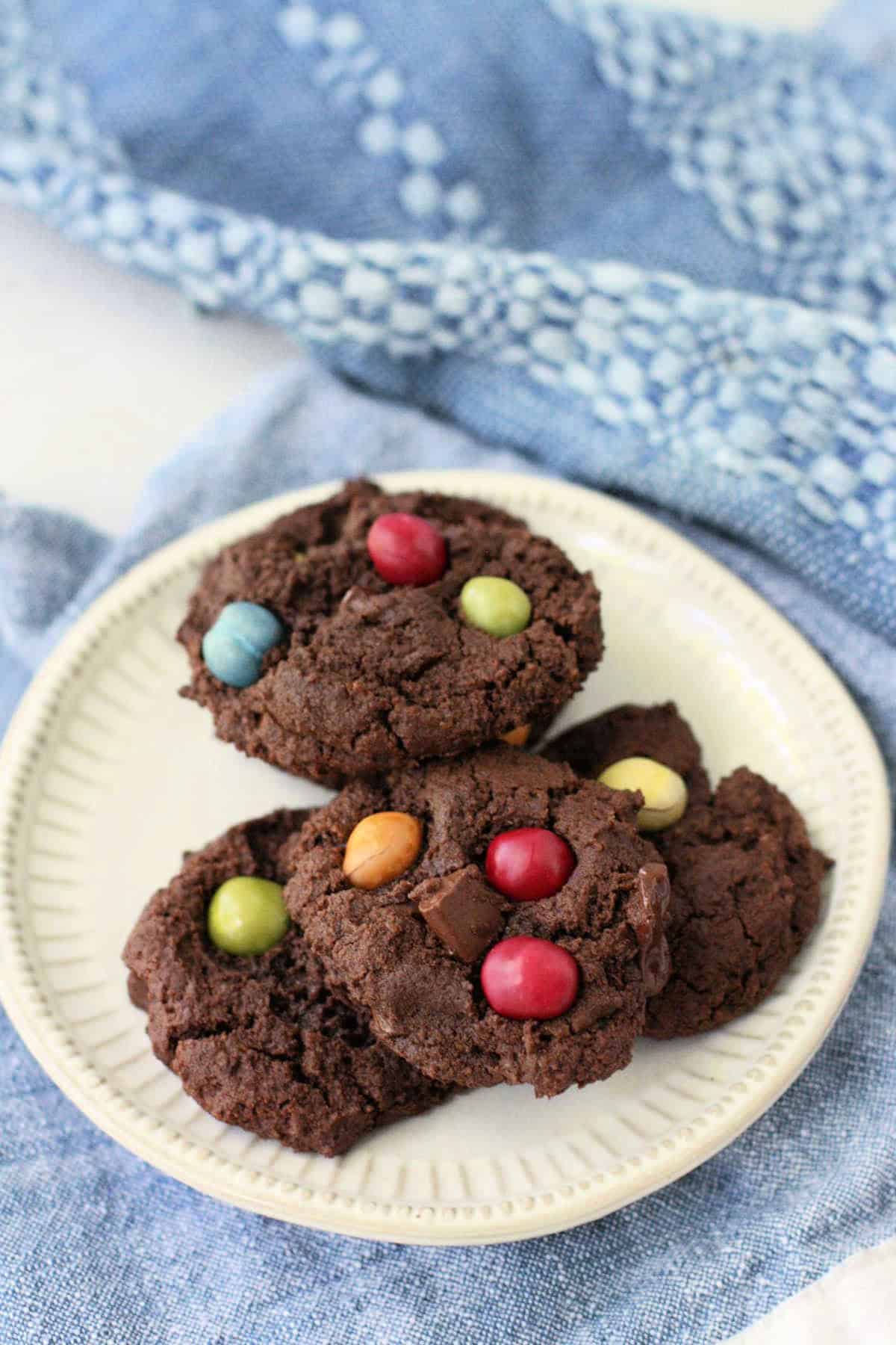 double chocolate gluten free vegan cookies on a white plate